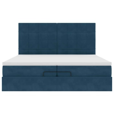 Cama estofada azul escuro com colchão branco e cabeceira acolchoada