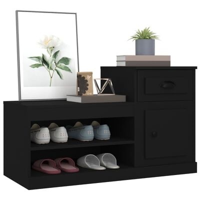 Móvel organizador preto com calçado, gaveta, porta e decoração no topo.