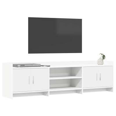 Móvel de televisão branco com unidade de DVD e planta, TV preta montada na parede.