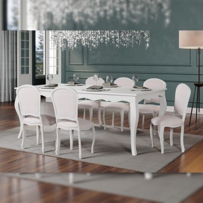 Conjunto de mesa e cadeiras de sala de jantar brancas numa sala moderna