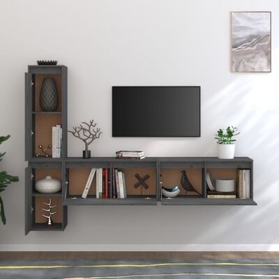 Móvel de parede cinzento com nichos e decoração variados numa sala