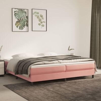 Cama de casal estofada rosa com roupa de cama branca e manta cinza em quarto moderno