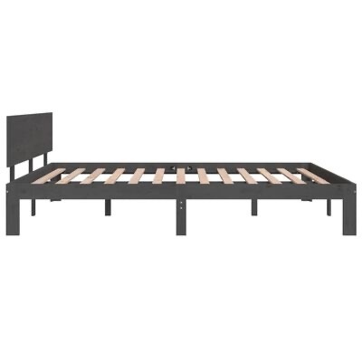 Estrutura de cama metálica cinzenta com ripas de madeira claras