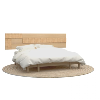 Cama com estrutura de madeira clara, edredão branco e tapete redondo bege de fibras naturais