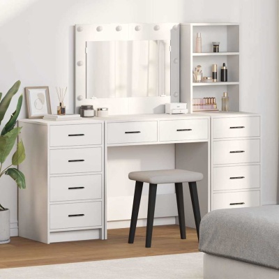 Penteadeira branca com espelho iluminado, gavetas e banco cinzento num ambiente interior minimalista