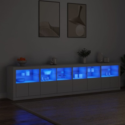 Móvel branco com prateleiras iluminadas em azul e utensílios de cozinha brancos na sala