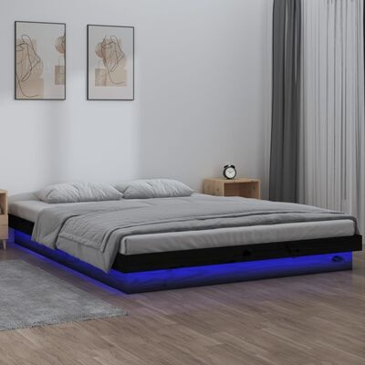 Cama moderna com iluminação LED azul e decoração minimalista