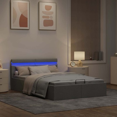 Quarto com cama de casal cinza estofada e luz LED azul na cabeceira