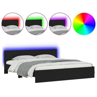 Cama preta com cabeceira iluminada por LED colorido e roupa de cama cinza e branca