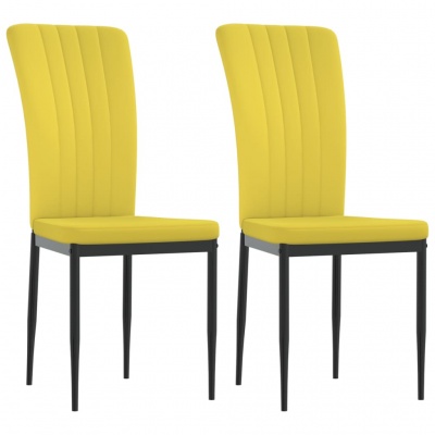 Duas cadeiras de jantar amarelas com pernas pretas