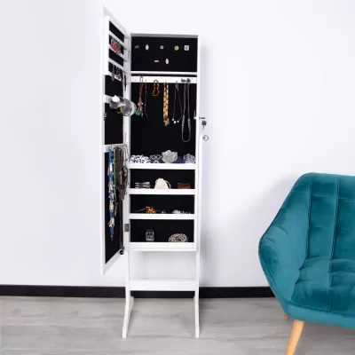 Organizador branco com joias e poltrona azul turquesa