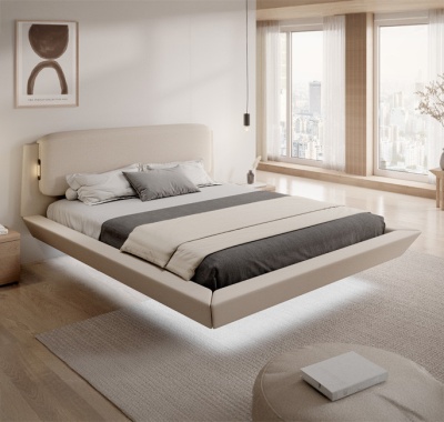 Quarto moderno com cama estofada bege e roupa de cama cinza e branca