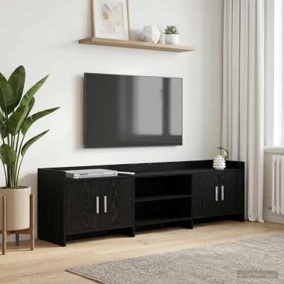 Móvel de televisão preto com televisão montada na parede branca com prateleira de madeira decorada e planta verde ao lado