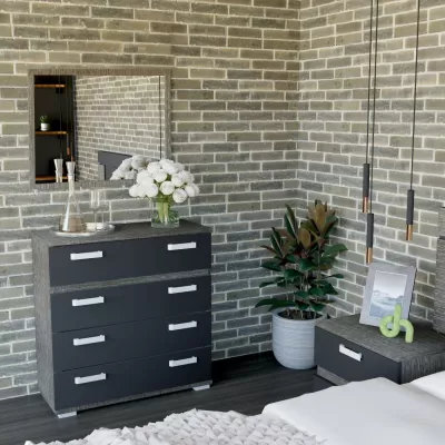 Mobiliário de quarto cinzento escuro com cómoda, mesa de cabeceira, espelho, planta e decoração