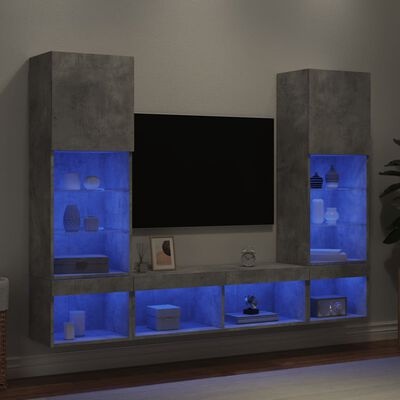 Móvel modular cinza escuro com prateleiras iluminadas a azul e televisão de ecrã plano
