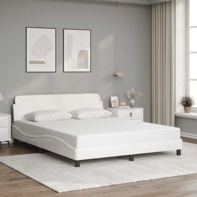 Quarto minimalista com cama branca e decoração neutra