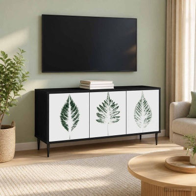Aparador preto com portas decoradas com folhas, televisão montada e planta ao lado