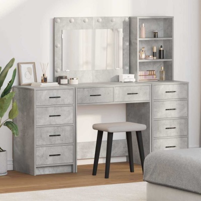 Penteadeira cinza em estilo moderno com espelho e luzes, gavetas e banco em quarto moderno.
