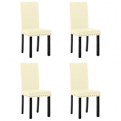 Quatro cadeiras bege com pernas pretas e rebites metálicos