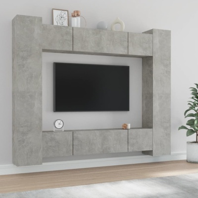 Estante modular cinzenta com TV montada e objetos decorativos