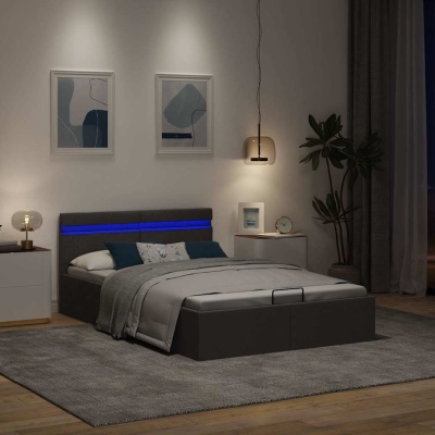 Quarto com cama de casal cinzenta estofada com iluminação azul e decoração moderna