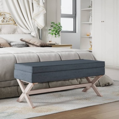 Banco estofado azul-escuro com pernas em madeira clara em quarto moderno