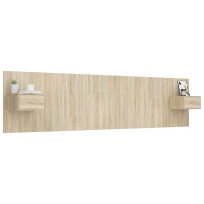 Painel de cabeceira de madeira clara com dois armários suspensos e decoração