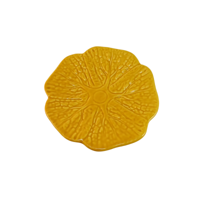 Prato decorativo amarelo em forma de flor com textura