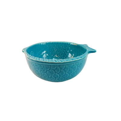 tigela azul turquesa com texturas e bico lateral
