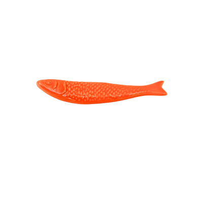 Utensílio ou decoração forma de peixe laranja textura escamas