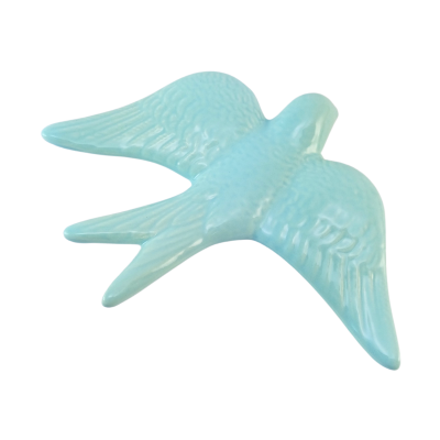 Figura decorativa azul claro em forma de pássaro com asas abertas