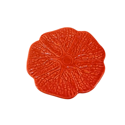 Prato decorativo em cerâmica laranja com textura de fruta