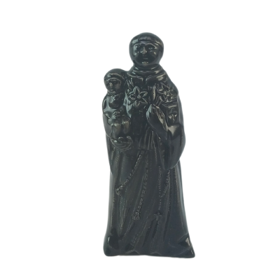 Estátua pequena de santo preta segurando criança