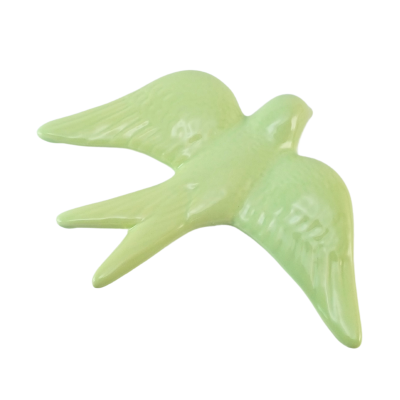 Figura decorativa em cerâmica verde em forma de pardal.
