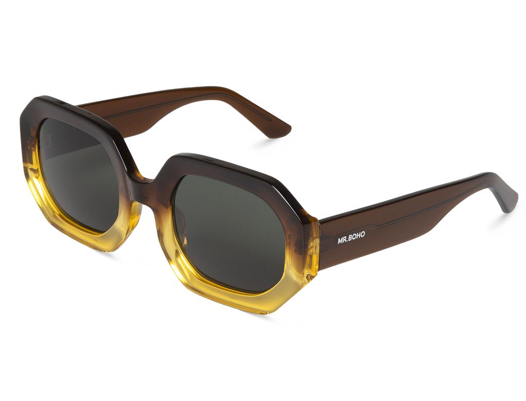 Óculos de sol octogonais com armação castanha e amarela e lentes escuras