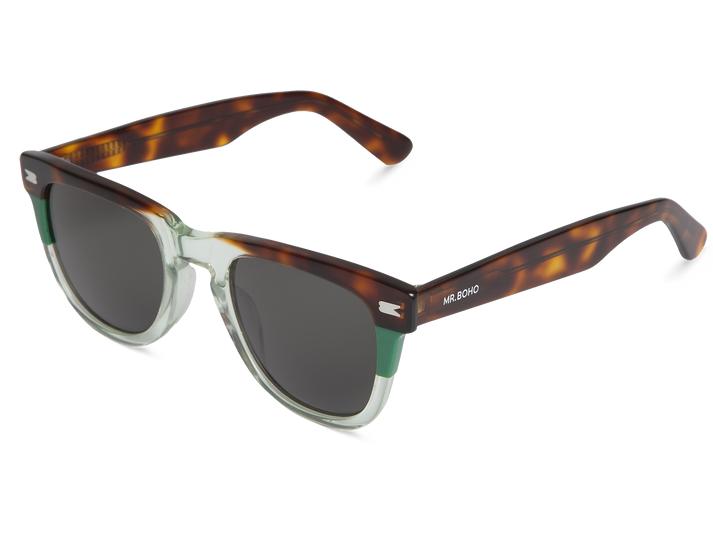 Óculos de sol com armação castanha padrão tartaruga e verde translúcido