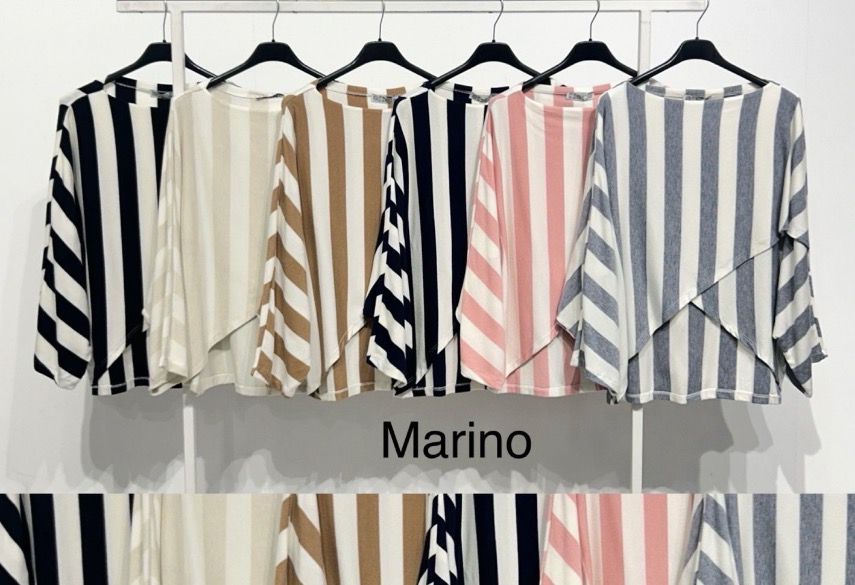 Seis camisolas riscas verticais em várias cores penduradas