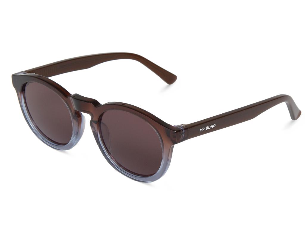 Óculos de sol castanhos com lentes escuras e armação mole