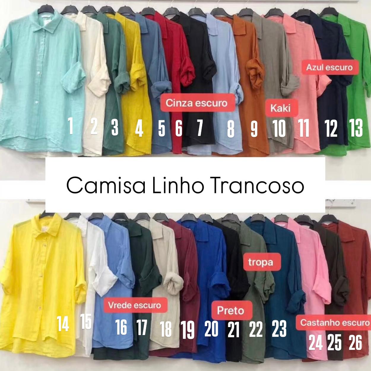 26 camisas de linho coloridas penduradas com etiquetas de cores e texto Camisa Linho Trancoso