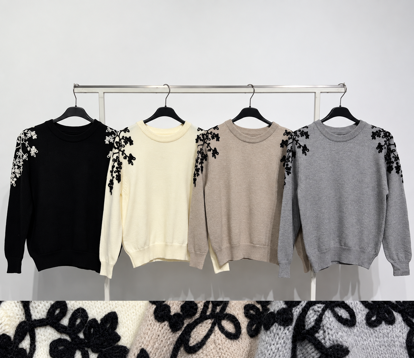 Quatro camisolas de malha com padrão floral em relevo nos ombros, diferentes cores