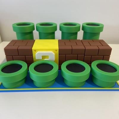 Figura em plástico de blocos e tubos verdes estilo Super Mario