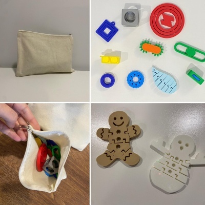 Acessórios plásticos coloridos com mala de tecido bege e moldes de boneco de gengibre e boneco de neve