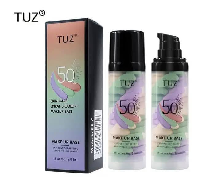 Base de maquilhagem TUZ 50 Skin Care com embalagem preta e frascos coloridos