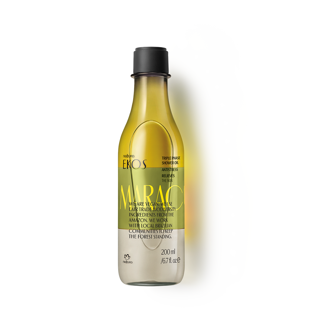 Frasco transparente com óleo amarelo e rótulo Natura EKOS