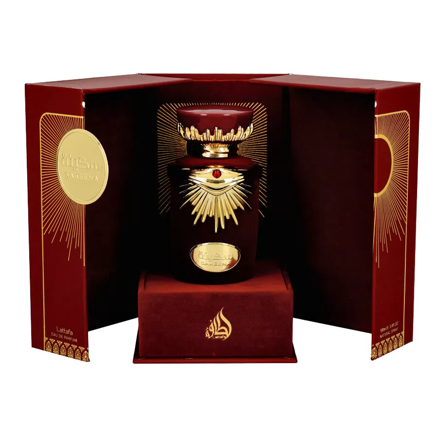 Frasco vermelho e dourado em caixa vermelha com texto LATTAFA PERFUMES