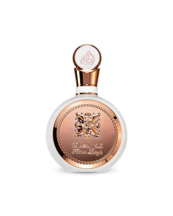 Frasco redondo de vidro transparente com tampa dourada e rótulo metálico dourado