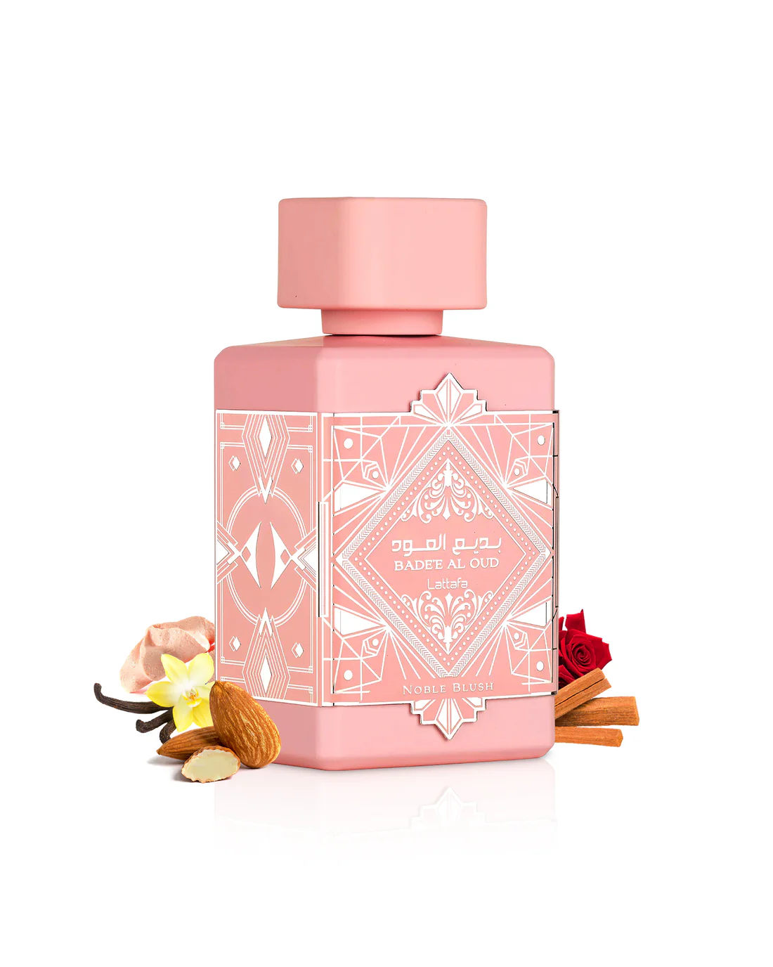Frasco rosa de perfume Badee Al Oud com decoração geométrica e elementos naturais ao redor
