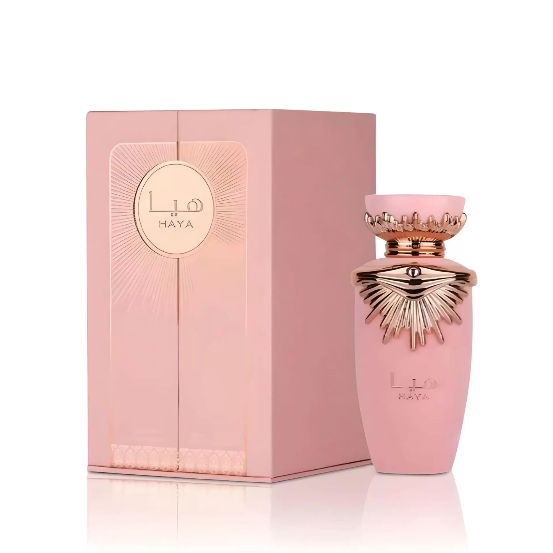 Perfume feminino em frasco rosa com detalhes dourados e caixa rose