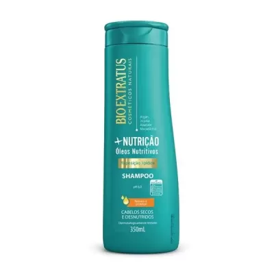 Frasco verde de shampoo Bio Extratus com texto informativo em português.