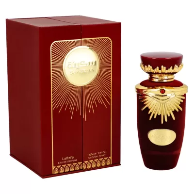 Frasco e caixa de perfume vermelho escuro com detalhes dourados e texto Ajwaa